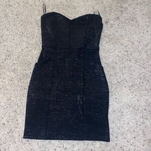 Never worn black strapless dress that has pockets